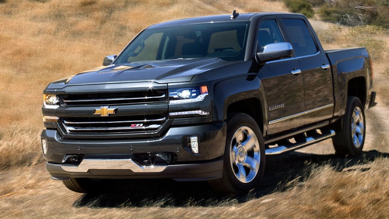 Front side view of Chevrolet Silverado driving off-road