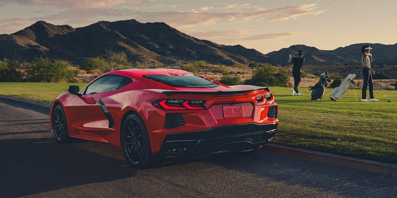 Rear side view of Chevrolet Corvette parked near golf course