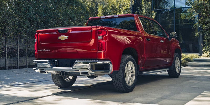 Rear view of Chevrolet Silverado pickup truck parked outdoors