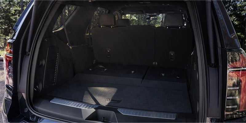 Rear cargo area of Chevrolet SUV with seats